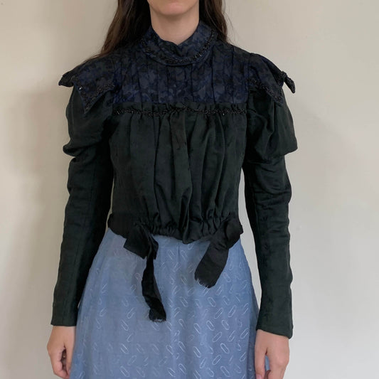 1890s Gigot Sleeve Victorian Bodice in black wool with blue high neck and glass beads