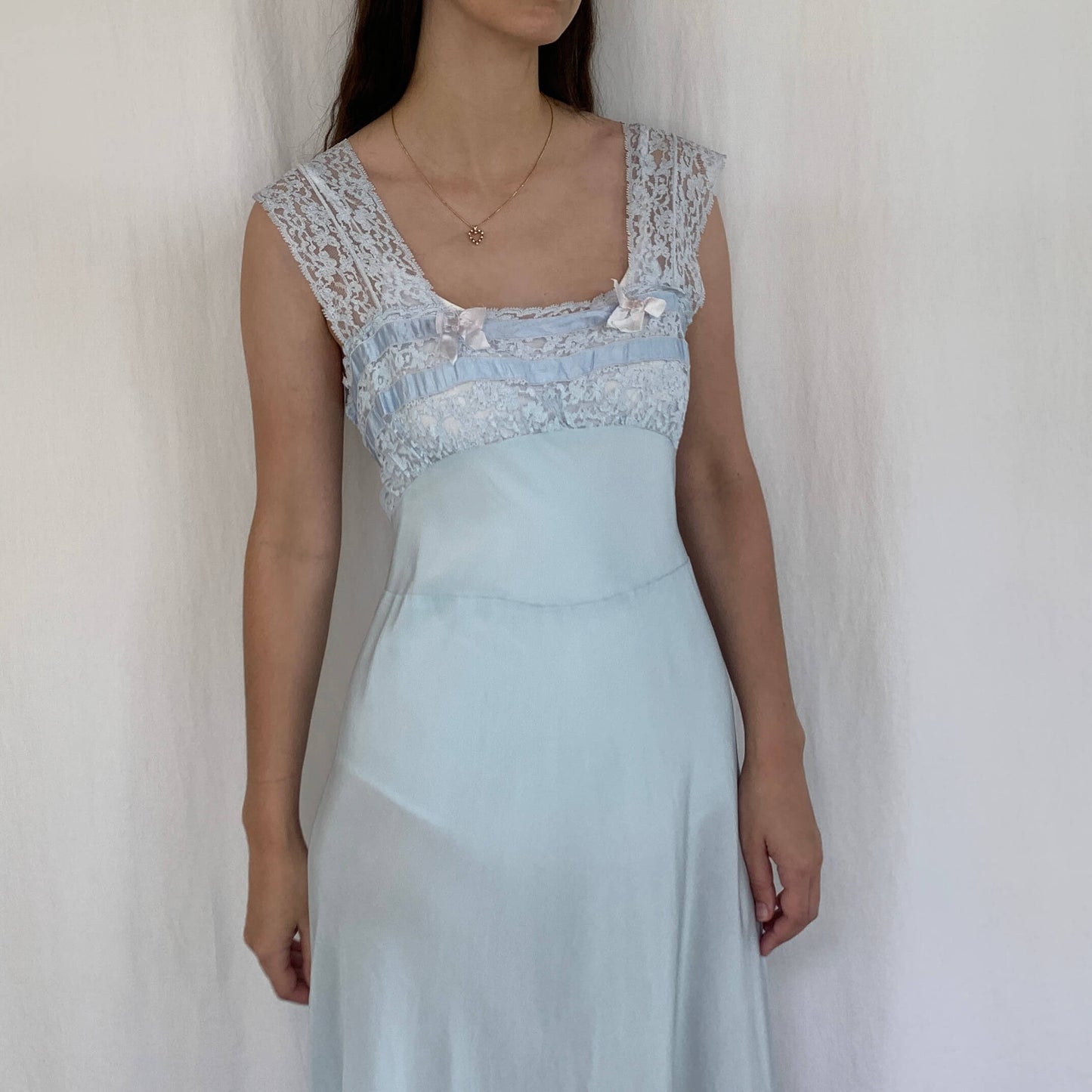 1930s nightgown on model showing lace bodice