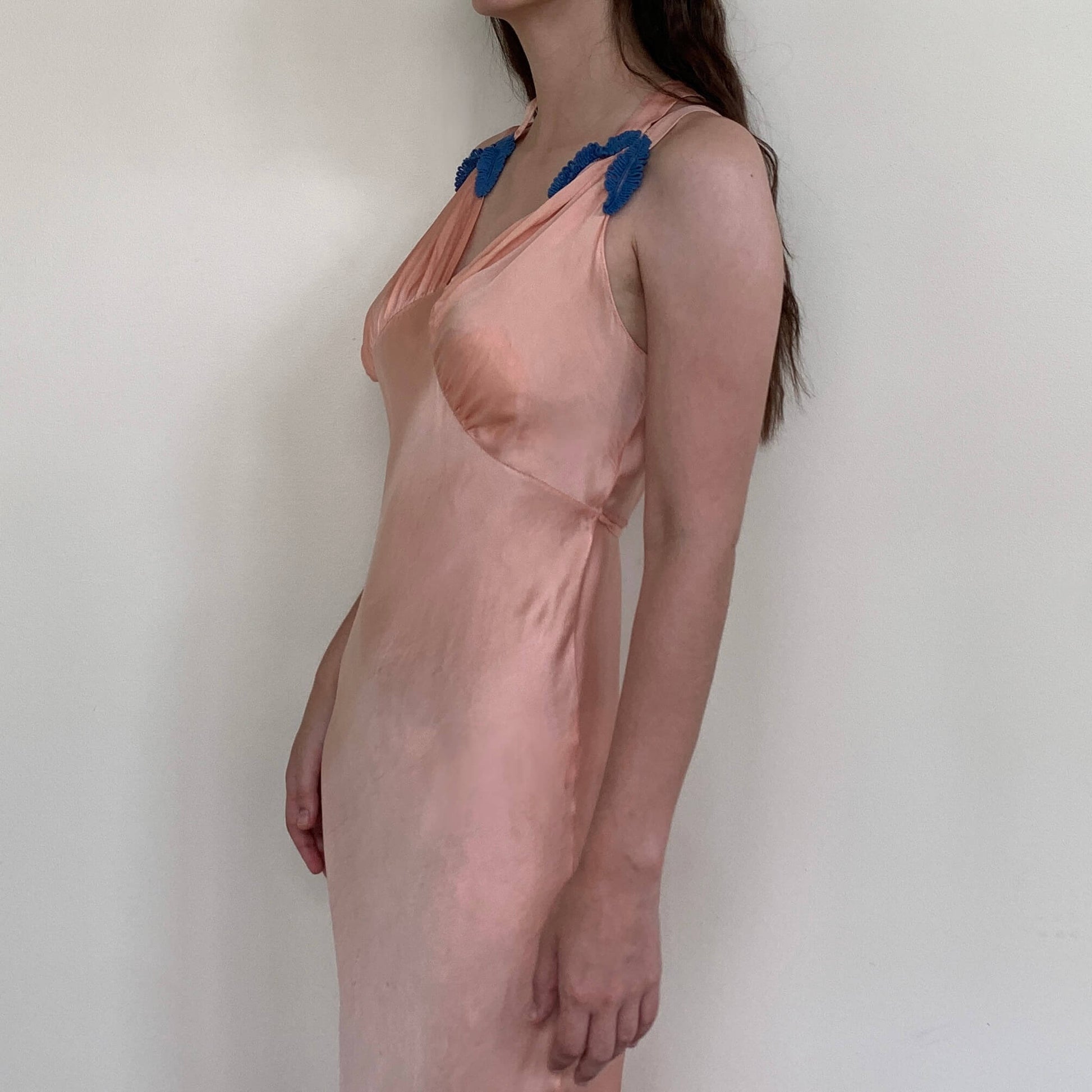 side view of the pink nightgown worn on a model