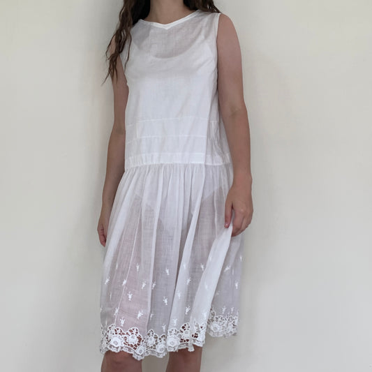 white batiste cotton Edwardian chemise with openwork embroidery on a model