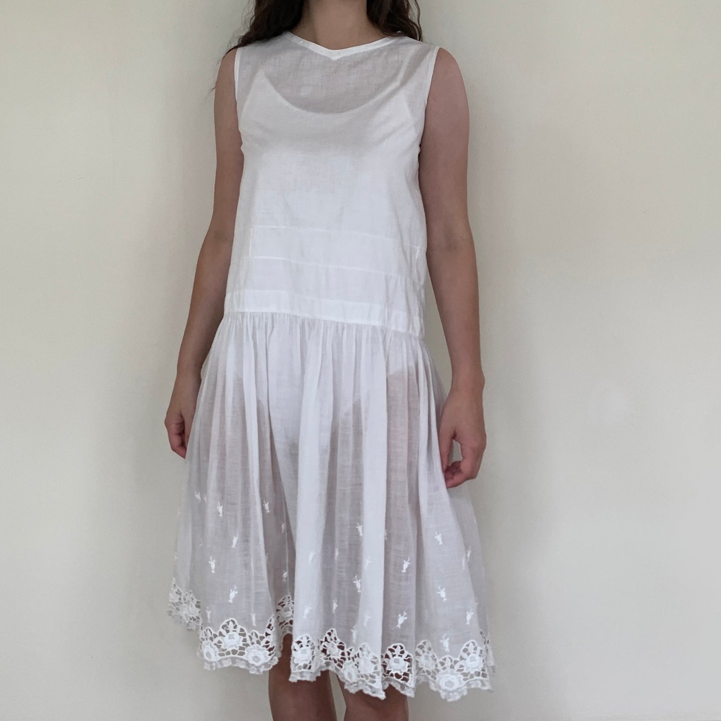 girls white cotton victorian nightgown worn on a person standing forward