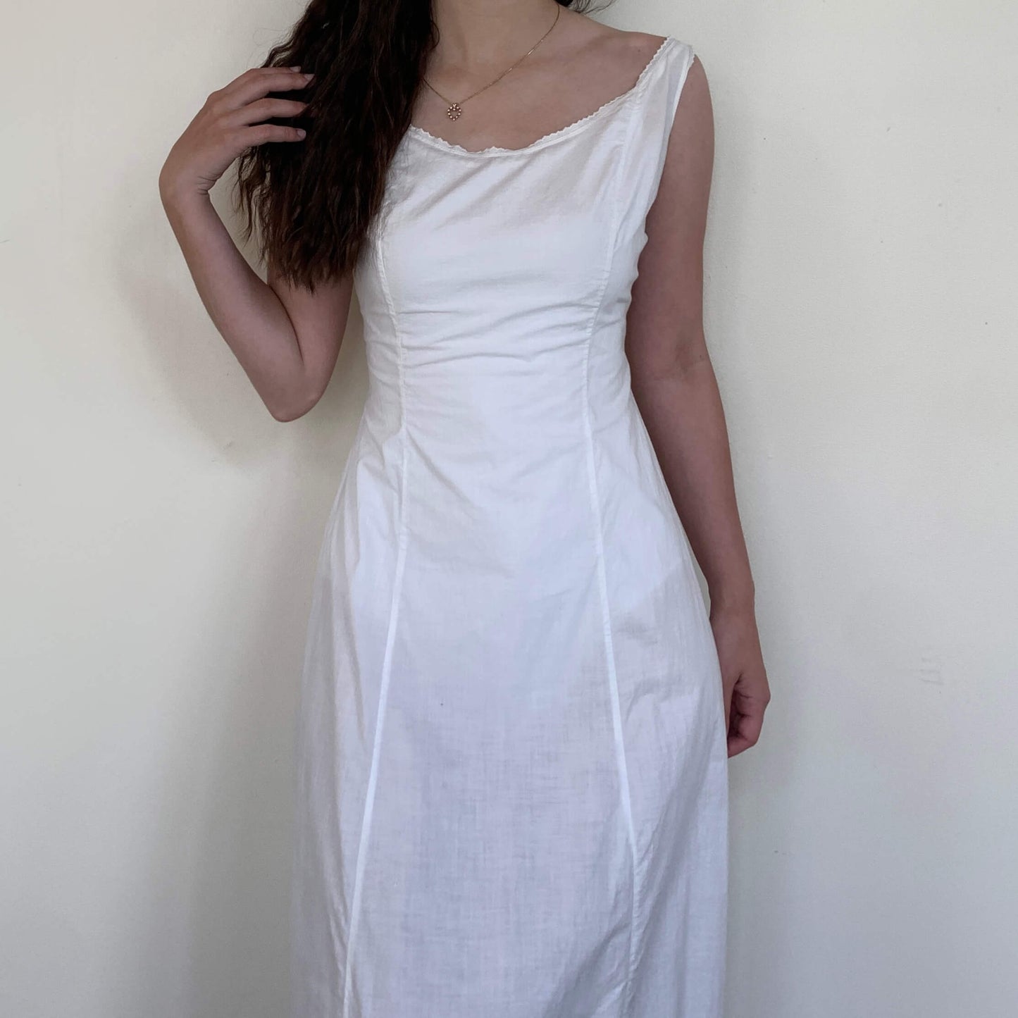 model wearing a simple edwardian wedding dress