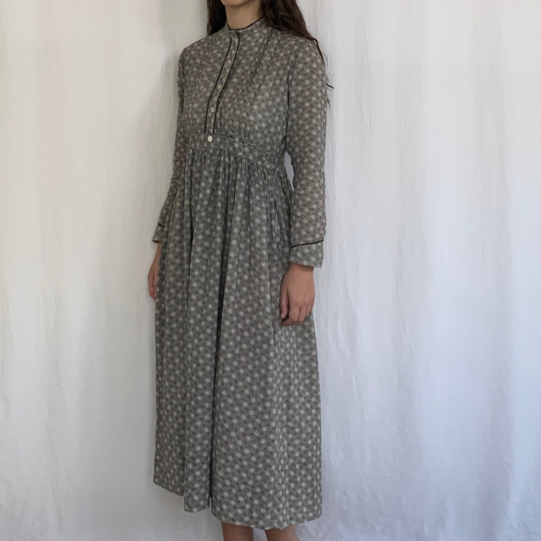 Vintage gray cotton Edwardian work dress on a model