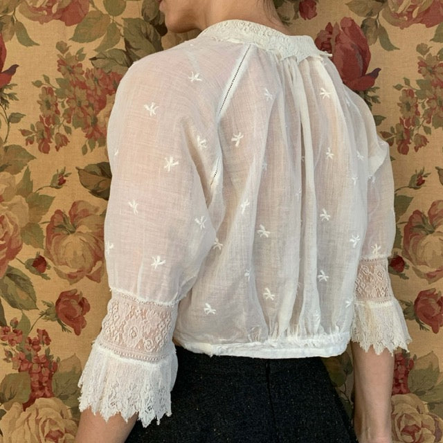 Vintage Edwardian lace blouse side view with ruffled lace sleeves