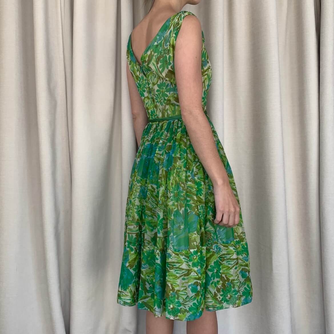 The same green 50s dress view from the side
