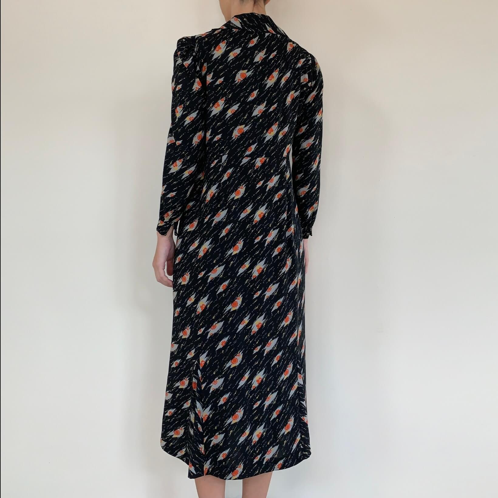 back view of the 1930s black dress