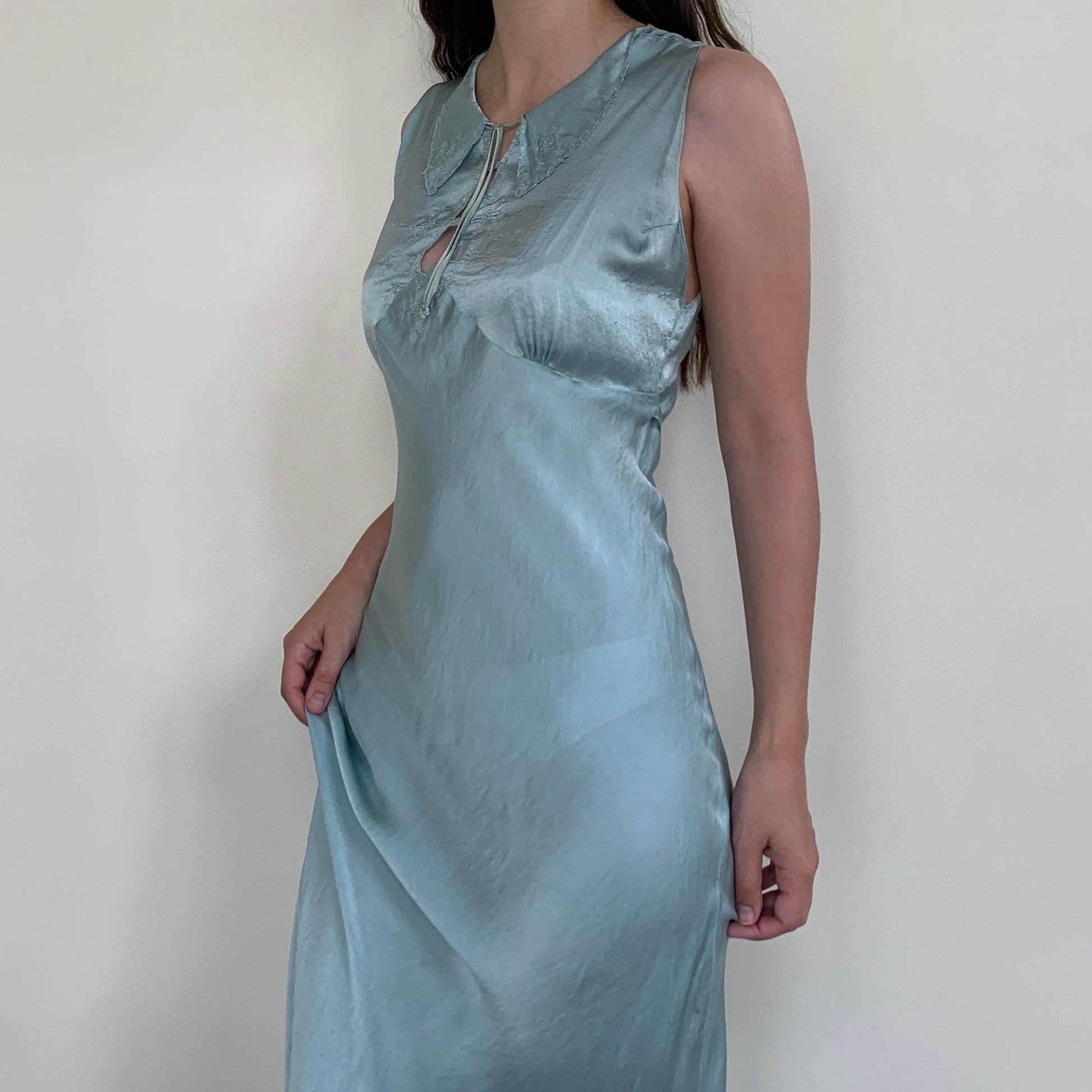 vintage silk dress on model facing to the side