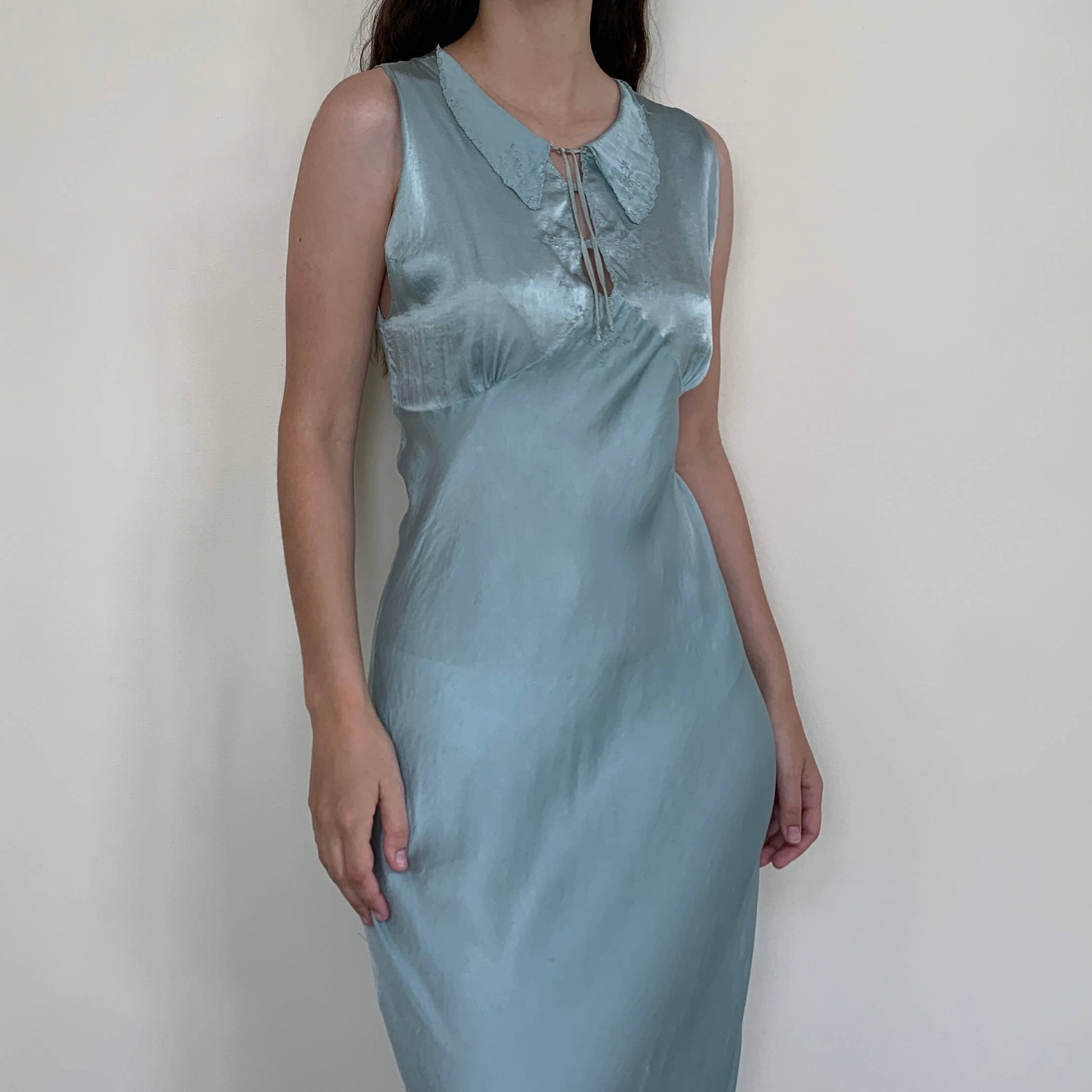 1930s nightgown front view on model showing aqua blue silk