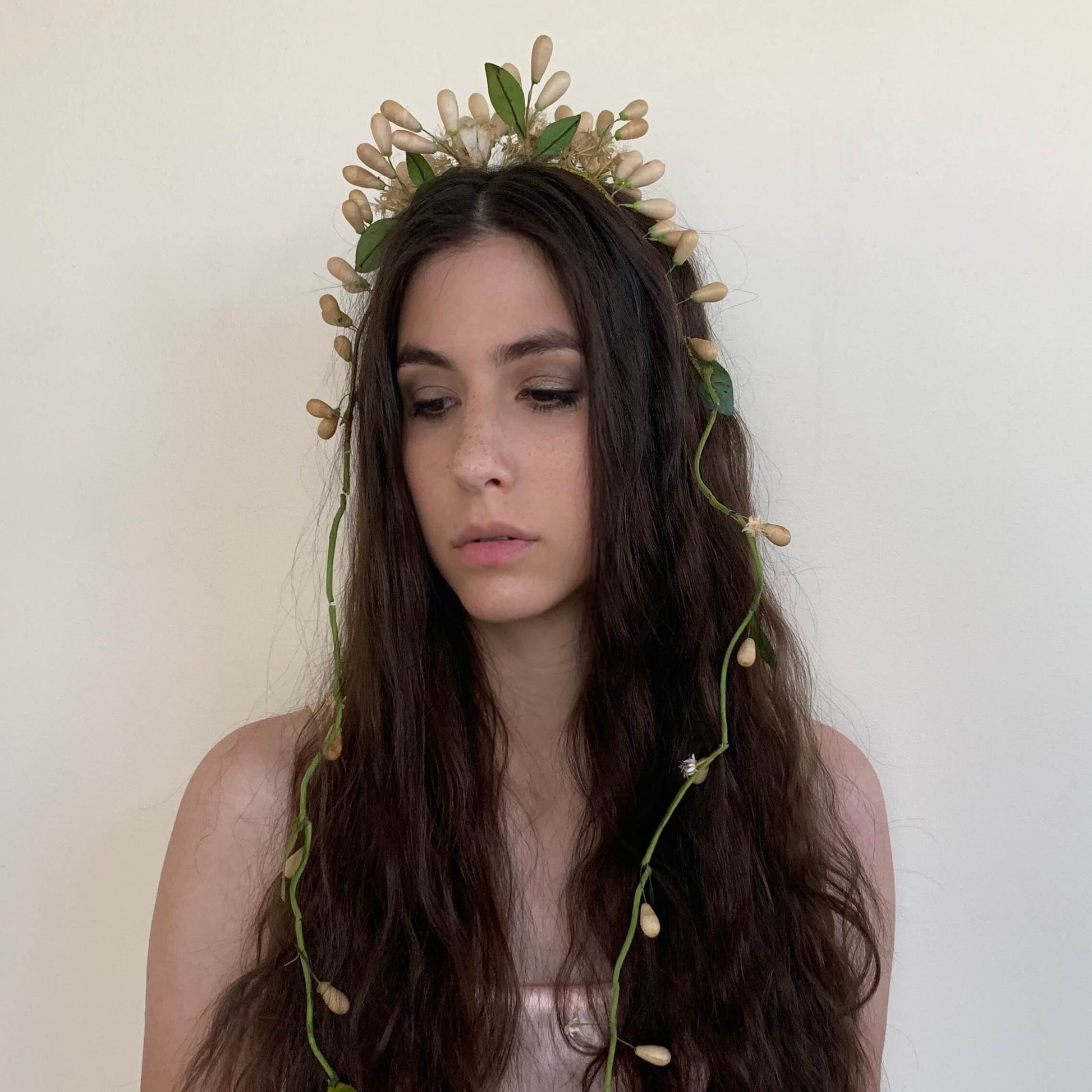 Victorian Ivory Wax flower crown with leaves and orange blossom buds worn on model