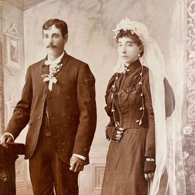 1880s wedding cabinet card with a newly married couple