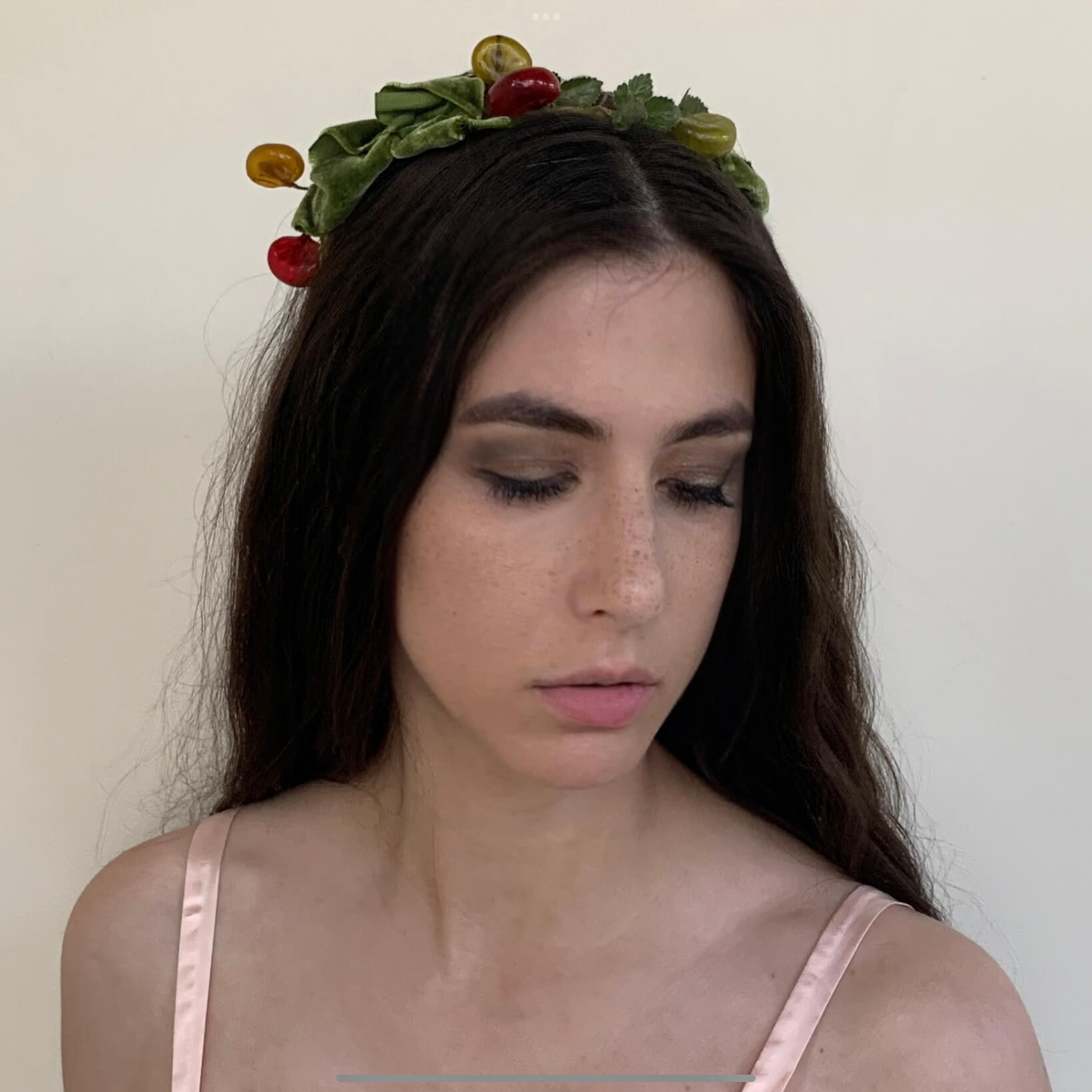vintage woodland fairy crown on a model with celluloid berries and green velvet bows