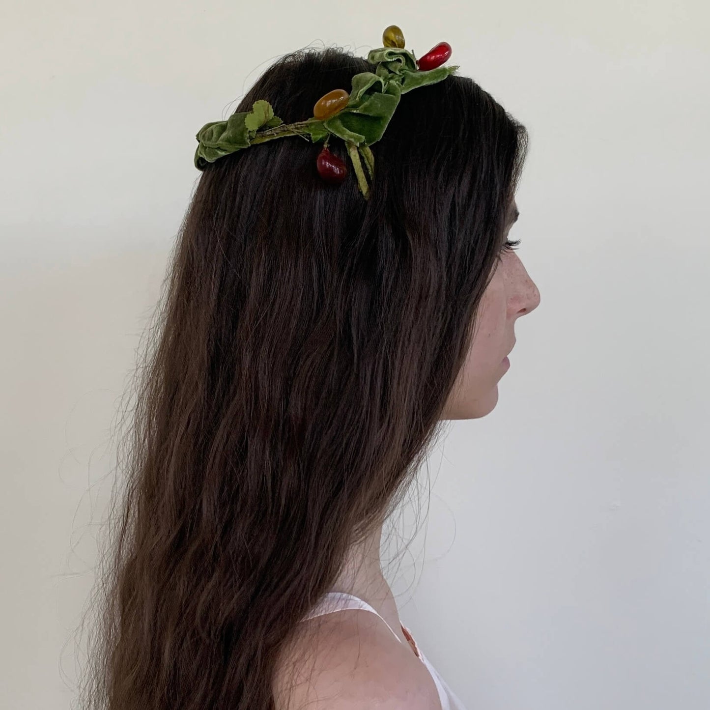 side view of the green head dress